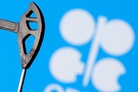 OPEC+ agrees to stick to its existing policy of reducing oil production