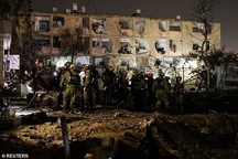 Iran ballistic missile hits Israeli city in terrifying strike near top-secret facility that is key to country's atomic weapons program